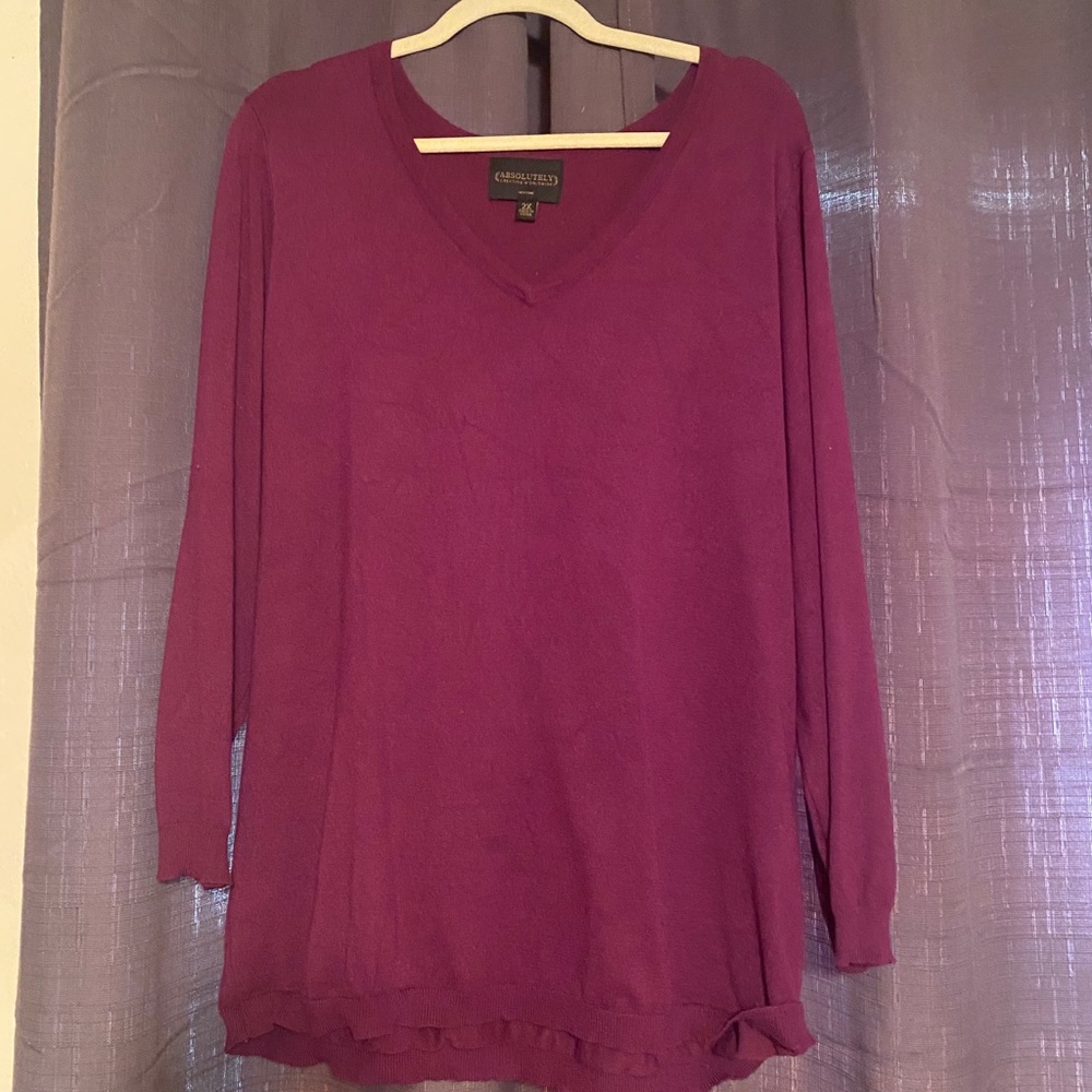 Purple sweater. Very good condition.